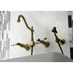KS124XPLBS-P Heritage Two-Handle Wall Mount Bridge Kitchen Faucet with Brass Sprayer Wall Mounted Kitchen Faucets