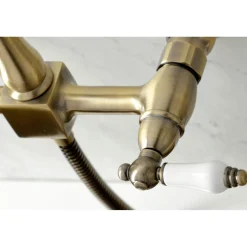 KS124XPLBS-P Heritage Two-Handle Wall Mount Bridge Kitchen Faucet with Brass Sprayer Wall Mounted Kitchen Faucets