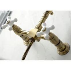 Discount KS124XPXBS-P Heritage Two-Handle Wall Mount Bridge Kitchen Faucet with Brass Sprayer Wall Mounted Kitchen Faucets